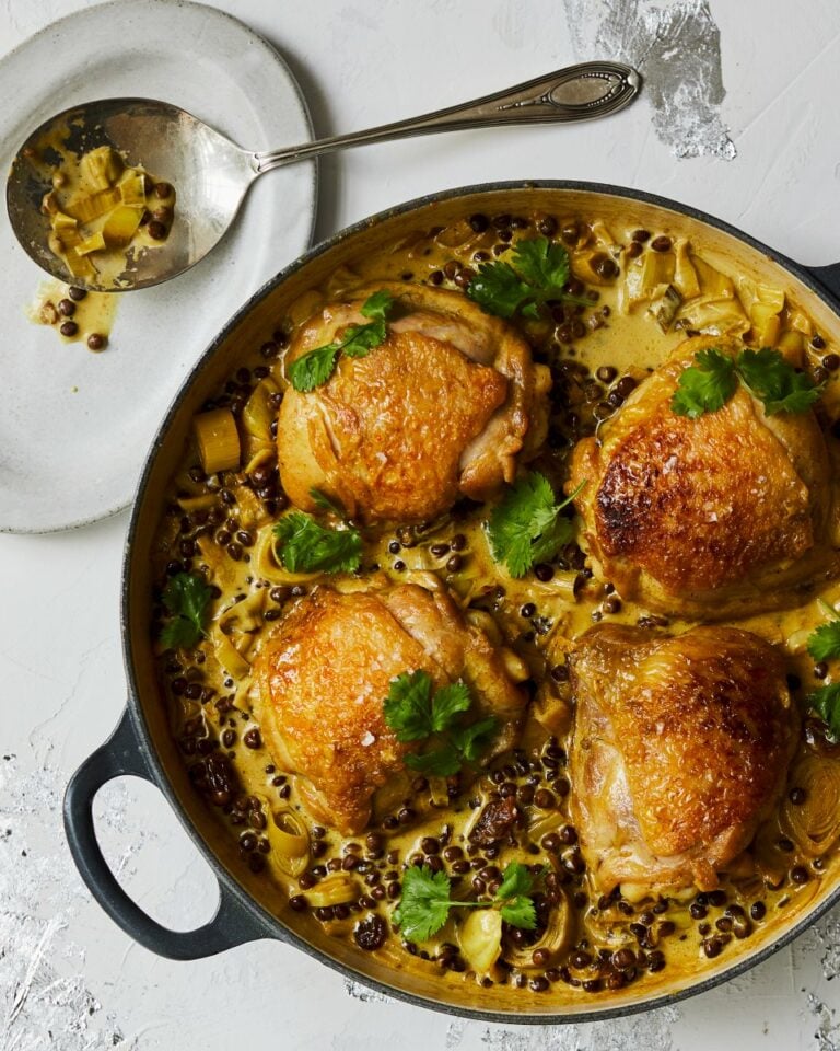Chicken thighs with curried leeks and lentils