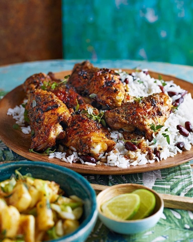 Jerk chicken with coconut rice and peas and pineapple salsa
