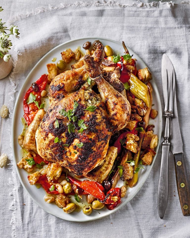 Roast chicken with leeks, peppers and olives